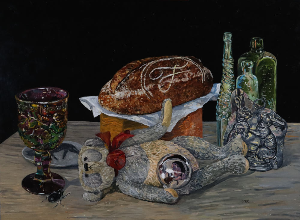 Still life oil painting, featuring a pink, oil spill finish Madonna Inn goblet, a loaf of bread from Franquette bakery with an 'F' on it in flour, old dug up bottles, a hand made teddy bear on its side holding a reflective bauble with the artist reflected in it, and a rhinoceros beetle.